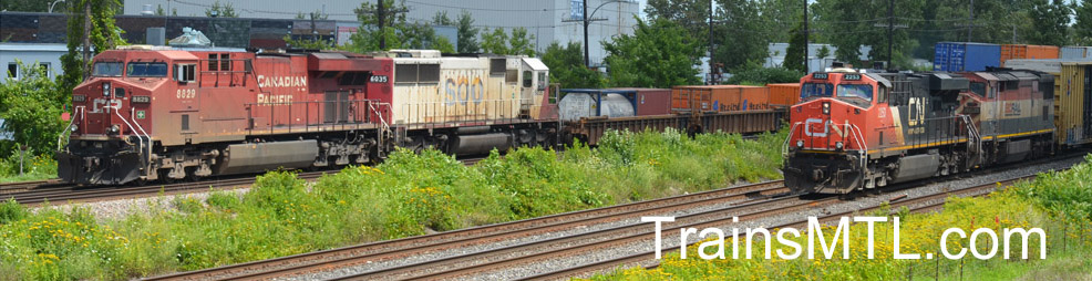 We see 2 trains on the pictures, on the CP line; a CP locomotive followed by a SOO locomtive; on the CN line; A CN locomotive followed by a BC Railone / 2 trains sur la photos; sur la voie du CP, une locomotive CP suivie par une locomotive de la compagnie SOO et sur la voie du CN, une locomotive CN suivie par une locomotive de BC Rail